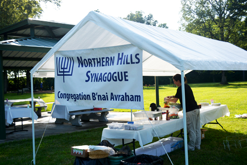 The Northern Hills Synagogue sign on the tent.